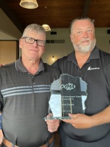 Bruce Cooke (left) is presented with the 2024 Lifetime Achievement Award by OGMA President Steven Ringler.