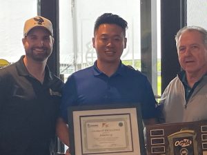 Joseph Le (centre) is awarded the OGMA/AGMCA 2025 Spring Bursary Award by OGMA President Blake Sanders (left) and AGMCA Executive Director Noel Marsella.